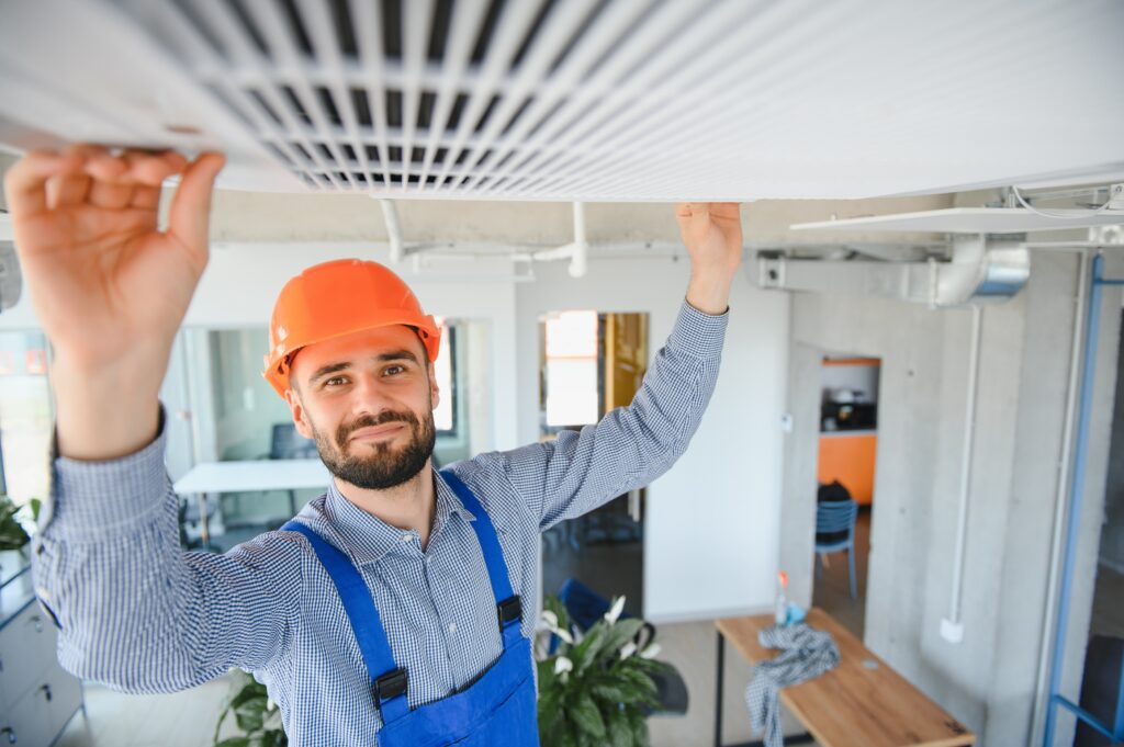 technician service checking and repairing air conditioner indoors technician service checking and repairing air conditioner indoors